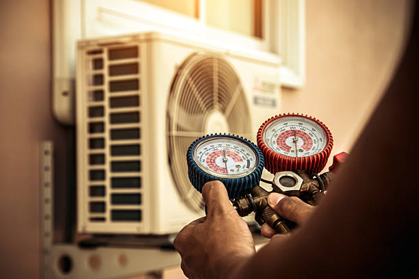 Professional Heat Pump Repair technician working in Tremont, IL